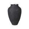 A dark and elegant textured vase