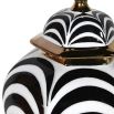 Dazzling statement jar in black and white with gold details. 