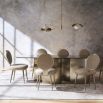 Experience elegance with the Aphelion Dining Table by Caracole. Modern design meets timeless style, perfect for memorable dining moments.