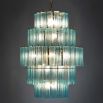 Elegant chandelier made up of layered blue glass tubes