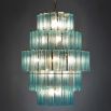 Elegant chandelier made up of layered blue glass tubes