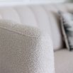 Deep fluted sofa in boucle with black legs