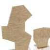 Stone effect beige sculptures mounded on clear crystal