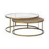 An exotic, elegant set of two rattan and glass coffee tables