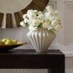 Elevate your decor with the Kaliana Vase, a stunning blend of elegance and artistry. Perfect for flowers or as a statement piece in any room.
