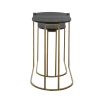 A glamorous set of nesting tables by Uttermost with oval tops and an antique brass finish
