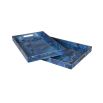 A beautiful blue marble effect tray with glistening gold details 