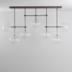 Black gunmetal industrial chandelier with multiple arms and clear glass globes