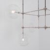 Polished nickel industrial retro chandelier with clear glass globe hanging design
