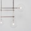 Polished nickel industrial retro chandelier with clear glass globe hanging design