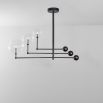 Black gunmetal finish chandelier with rotational arm fixture and clear glass globe design