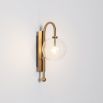 Natural solid brass industrial wall lamp with large handblown glass globe