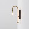 Natural solid brass industrial wall lamp with large handblown glass globe