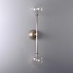 Retro natural brass wall lamp with clear glass globes