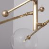 Natural brushed brass industrial style 3 arm chandelier with clear glass globe bulbs