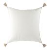 White cotton cushion cover with tassels at each corner