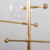 Natural brass finish industrial ceiling lamp with 8 arm fixture and 8 clear glass globes