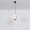 Contemporary retro style pendant ceiling light in a black gunmetal brass finish with translucent glass lampshade design