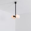 Industrial and modern style pendant ceiling lamp in a solid black brass finish