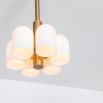 Contemporary natural brass pendant ceiling light with six translucent glass lampshade design