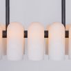Black gunmetal finish solid brass chandelier with a parallel row of translucent glass shades