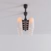 Black gunmetal finish solid brass chandelier with a parallel row of translucent glass shades