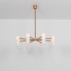 Glamorous retro chandelier with frosted glass lampshades and a solid, natural brass frame