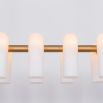 Contemporary natural brass finish chandelier with a colonnade of translucent glass lampshades