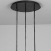 A luxury chandelier by Schwung with 9 frosted, opal glass shades and an industrial black gunmetal finish 