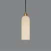 A luxury single pendant by Schwung with a natural brass finish and frosted glass shade