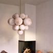 Elegant and eye-catching chandelier with glass orb shades with brass frame