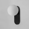 Enchanting rounded wall lamp mounted on gunmetal plate