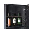 A luxurious wine cabinet created from black oak, brass details and luxurious royal blue velvet details