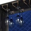 A luxurious wine cabinet created from black oak, brass details and luxurious royal blue velvet details