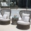 A luxury outdoor armchair with a natural and organic appeal