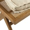 Vintage-style, wooden bench with a linen cushion