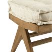 Vintage-style, wooden bench with a linen cushion