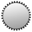 Black circular wall mirror adorned in metal balls