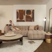 Right facing quilted taupe corner sofa