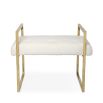 A chic boucle bench with a stylish brass frame