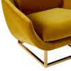 A luxurious golden-yellow velvet-upholstered lounge chair with a brushed brass base