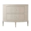 Charming, oval-shaped bedside table with two drawers and textured finish