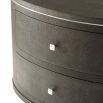 Opulent oval-shaped bedside table with textured finish