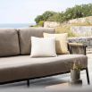 Stylish outdoor loveseat with grey/taupe cushions and black weave frame