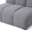 A luxury modular sofa with a beautiful boucle grey upholstery