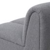 A luxury modular sofa with a beautiful boucle grey upholstery