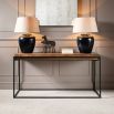 An elegant glazed table lamp with a contrasting linen shade