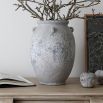 Charismatic distressed finish vase in grey