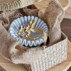 White marble bowl in carved curve design
