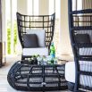 Rounded black weave coffee table with glass top